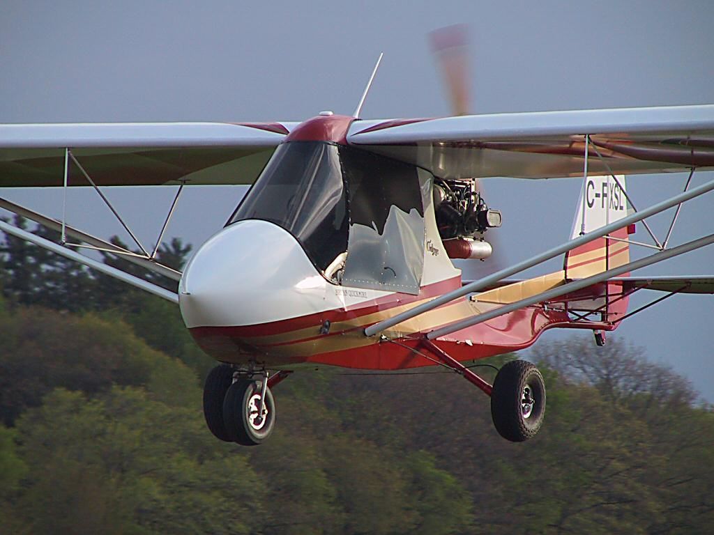 Microlight aircraft over the bush