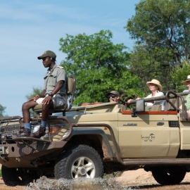 Placeholder — open safari vehicle on a game drive in Olifants West