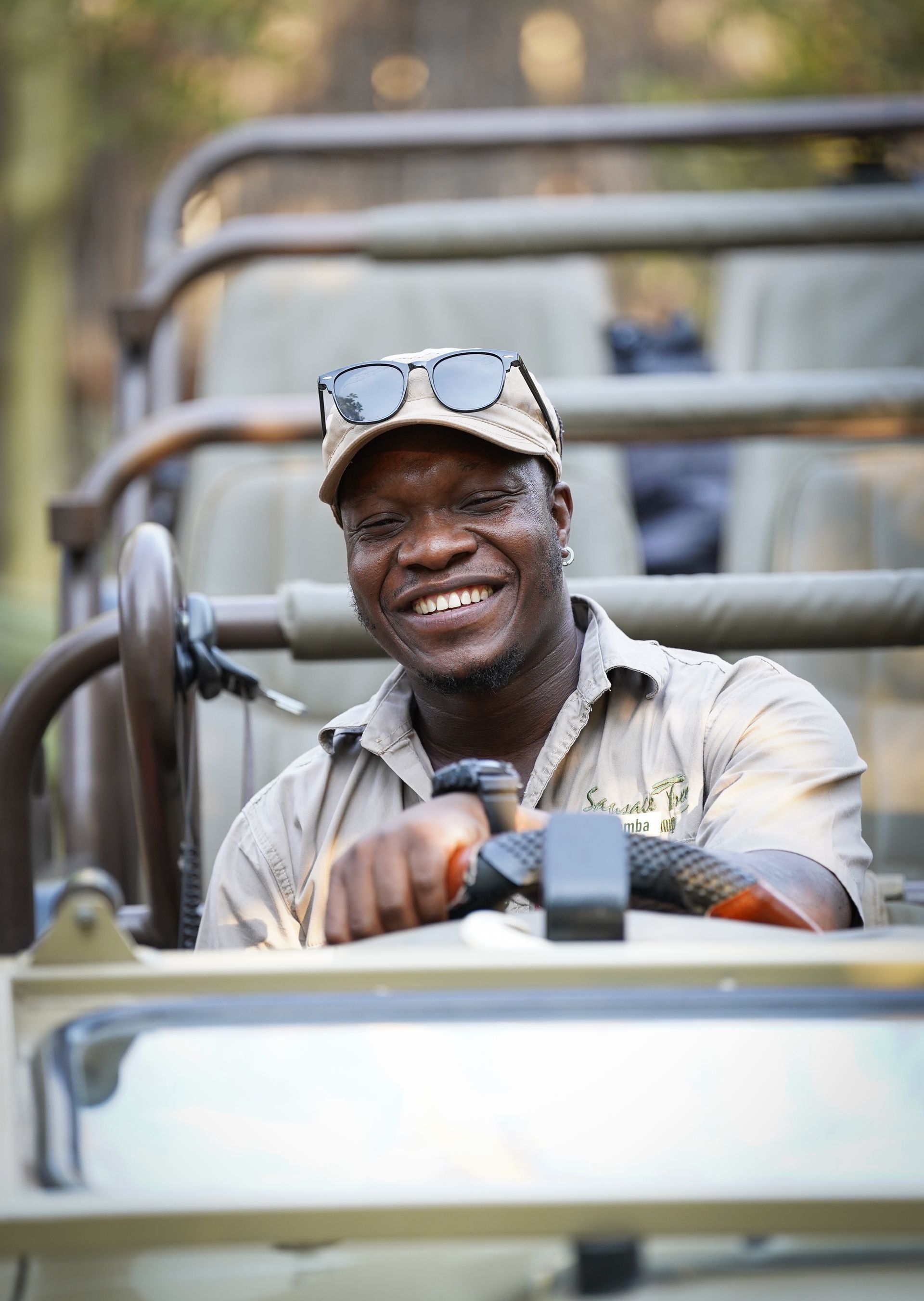 Themba scanning the bush from the safari vehicle