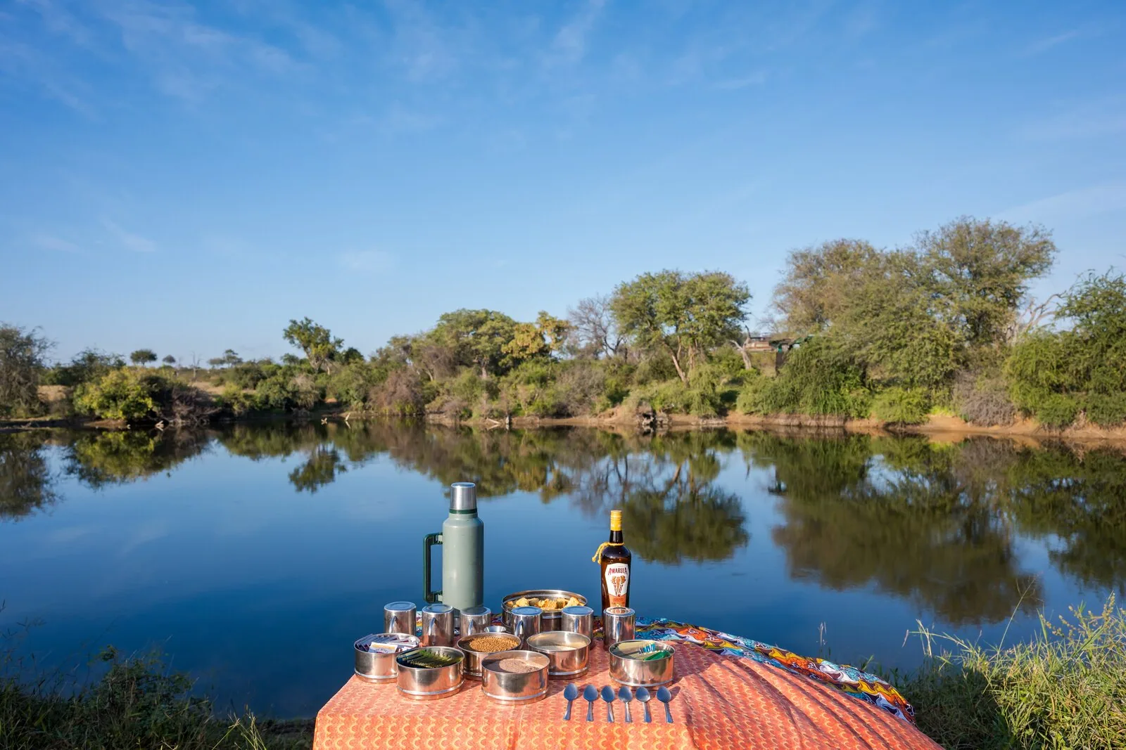 Water and a sundowner table at the camp waterhole